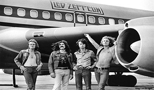 image of led zeppelin standing in front of their jet